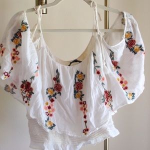 Floral flutter sleeve top